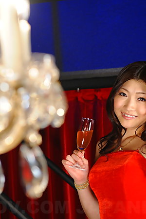 Arousing Karin Kusunoki poses in red dress