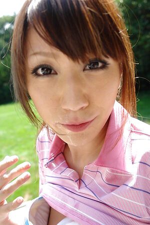 Karin Mizuno sucks cock while is fucked from behind on the golf field.