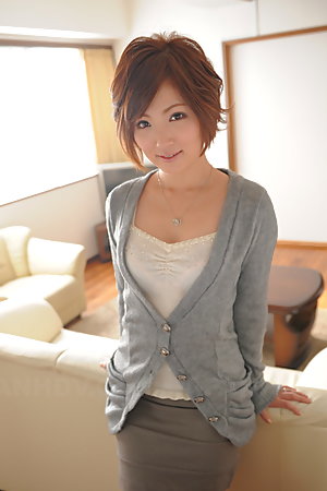 Kaede Oshiro with busy mouth shows sexy legs