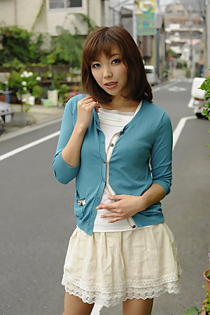 Juri Kitahara in blue sweater and lace skirt