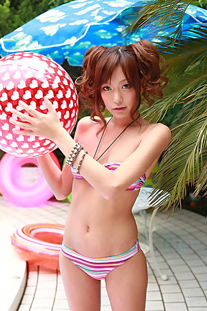Super fine Asian darling posing outdoors
