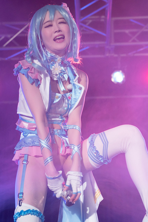 Japanese cosplayer Ria Kurumi fucks herself with a vibrator on the music stage